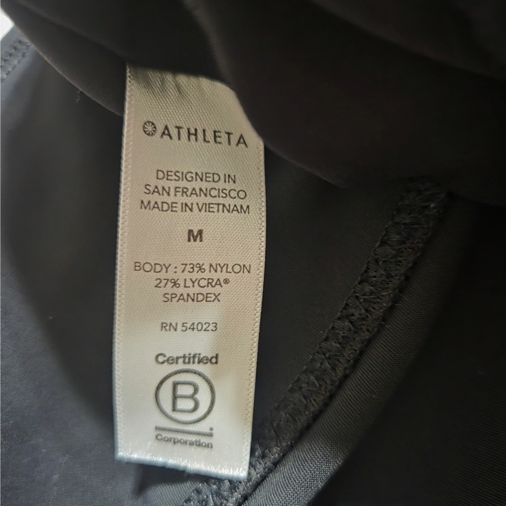 Athleta Stellar Tight Black High Rise Zipper Pocket Leggings Womens Size M - Picture 4 of 4